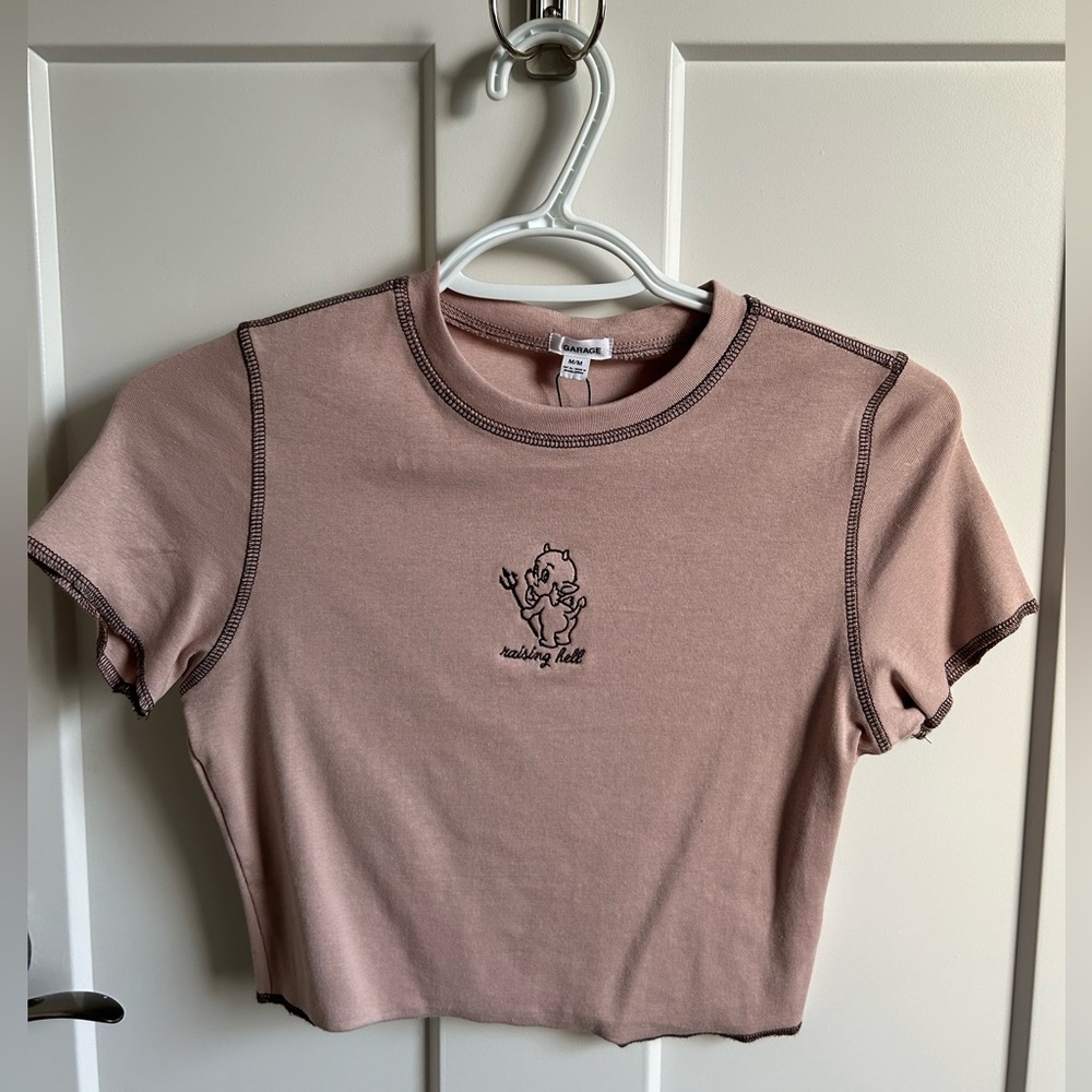 NWT Garage Graphic Stormi Tee